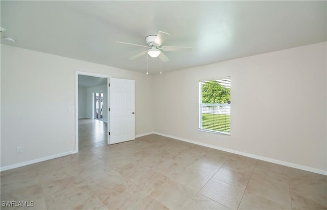 806 SW 4th Ave, Cape Coral, FL 33991 - spare room with ceiling fan and light tile patterned floors