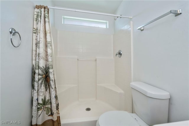 806 SW 4th Ave, Cape Coral, FL 33991 - bathroom with toilet and a shower with shower curtain