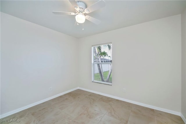 806 SW 4th Ave, Cape Coral, FL 33991 - unfurnished room featuring baseboards and a ceiling fan