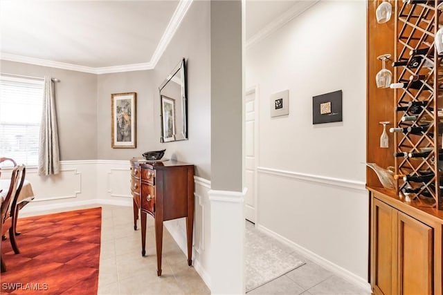 3260 Magnolia Landing Ln, North Fort Myers, FL 33917 - interior space with light tile patterned flooring, crown molding, and a wainscoted wall
