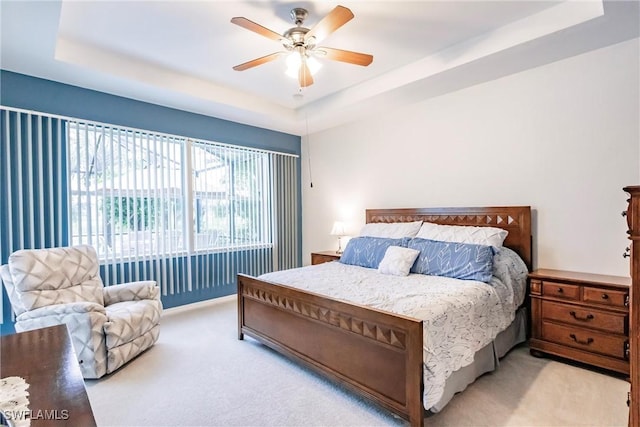 3260 Magnolia Landing Ln, North Fort Myers, FL 33917 - bedroom featuring carpet floors, a raised ceiling, and a ceiling fan