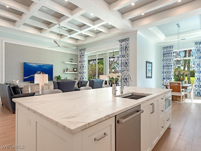 130 Burning Tree Dr, Naples, FL 34105 - kitchen featuring stainless steel dishwasher, a chandelier, light stone countertops, light wood-style floors, and beam ceiling