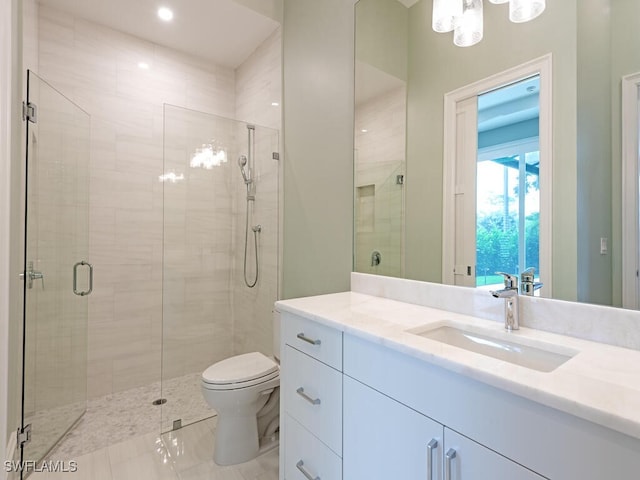 130 Burning Tree Dr, Naples, FL 34105 - full bathroom featuring vanity, a stall shower, and a chandelier
