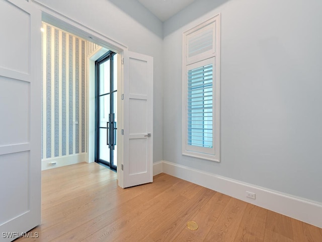 130 Burning Tree Dr, Naples, FL 34105 - unfurnished room featuring light wood-style flooring