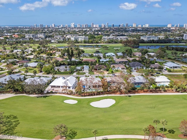 130 Burning Tree Dr, Naples, FL 34105 - aerial view of city skyline and a nearby body of water