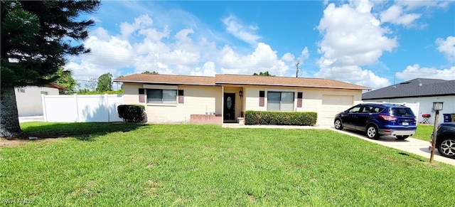 340 Inwood Ave S, Lehigh Acres, FL 33936 - ranch-style home with an attached garage and concrete driveway