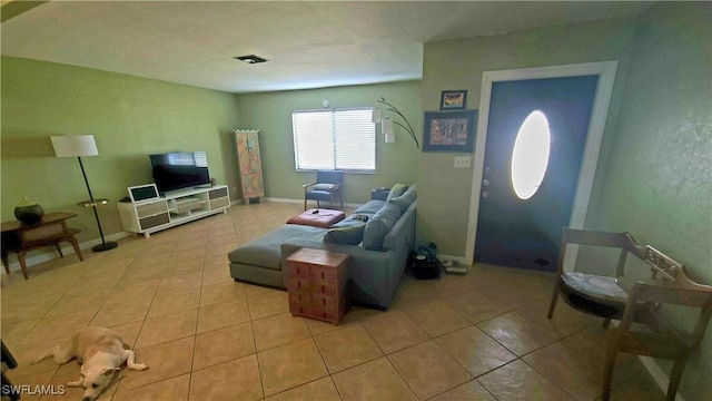 340 Inwood Ave S, Lehigh Acres, FL 33936 - living room featuring light tile patterned floors