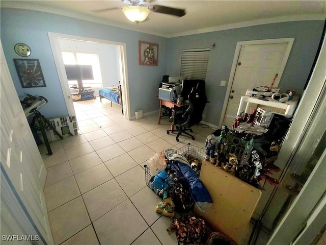 340 Inwood Ave S, Lehigh Acres, FL 33936 - office area featuring tile patterned flooring, ceiling fan, and ornamental molding