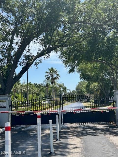 9950 Sailview Ct Unit 12, Fort Myers, FL 33905 - view of street featuring a gate