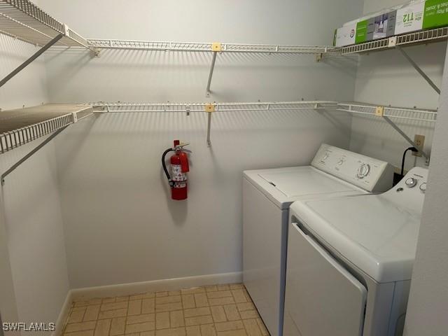 9950 Sailview Ct Unit 12, Fort Myers, FL 33905 - laundry area with separate washer and dryer and light floors