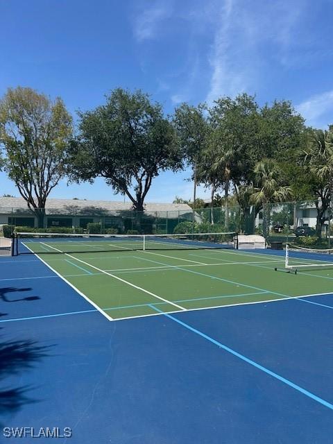 9950 Sailview Ct Unit 12, Fort Myers, FL 33905 - view of tennis court with community basketball court