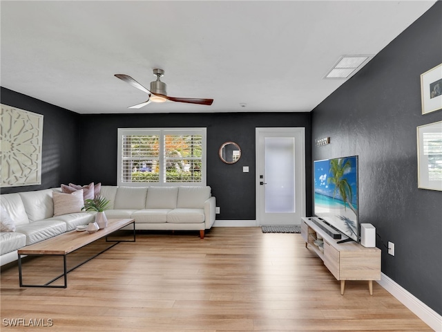 11810 Imperial Pines Way, Bonita Springs, FL 34135 - living room featuring a ceiling fan and light wood-type flooring
