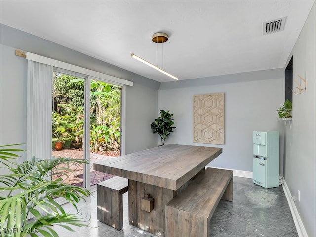 11810 Imperial Pines Way, Bonita Springs, FL 34135 - dining area featuring finished concrete floors and baseboards