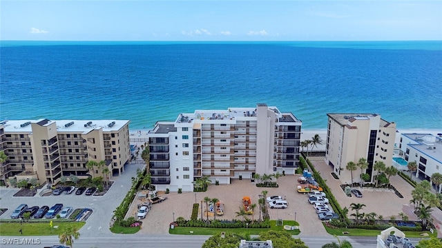 9375 Gulf Shore Dr Unit 402, Naples, FL 34108 - drone / aerial view of apartment complex and a large body of water