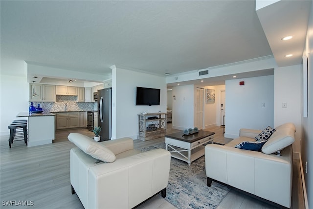 9375 Gulf Shore Dr Unit 402, Naples, FL 34108 - living room with recessed lighting and light wood-style flooring
