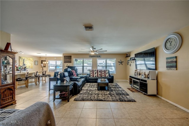 1817 SW 3rd Ave, Cape Coral, FL 33991 - living area with healthy amount of natural light, ceiling fan, and light tile patterned floors