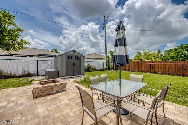 1817 SW 3rd Ave, Cape Coral, FL 33991 - fenced backyard with a patio, a storage unit, a fire pit, and outdoor dining area