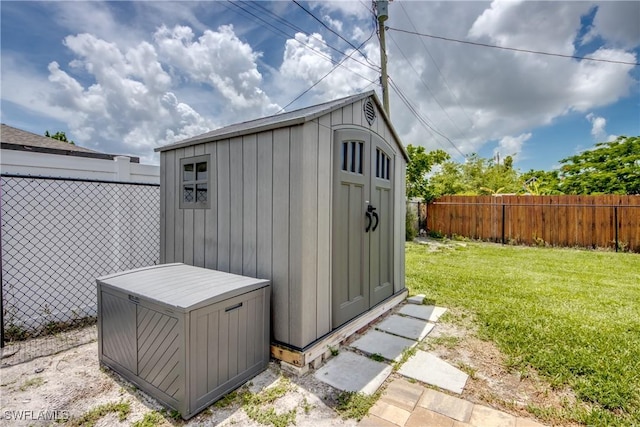 1817 SW 3rd Ave, Cape Coral, FL 33991 - view of shed featuring a fenced backyard