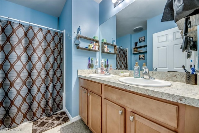1817 SW 3rd Ave, Cape Coral, FL 33991 - bathroom featuring double vanity, curtained shower, and tile patterned floors