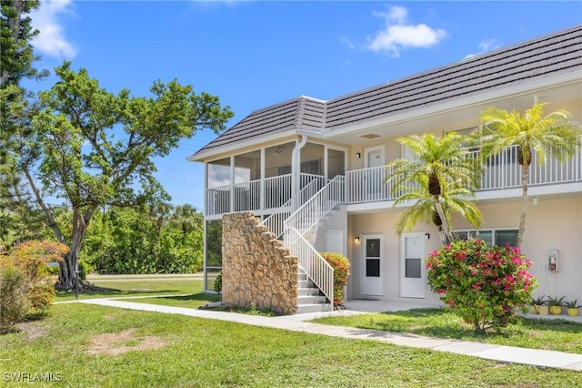 601 Periwinkle Way Unit D1, Sanibel, FL 33957 - view of building exterior with stairway