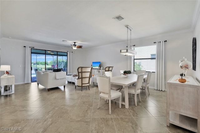 9207 Shadow Oak Ln, Naples, FL 34120 - dining area featuring ceiling fan, crown molding, and light tile patterned floors