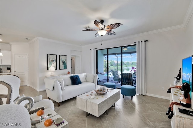 9207 Shadow Oak Ln, Naples, FL 34120 - living area with ceiling fan, ornamental molding, and light tile patterned floors