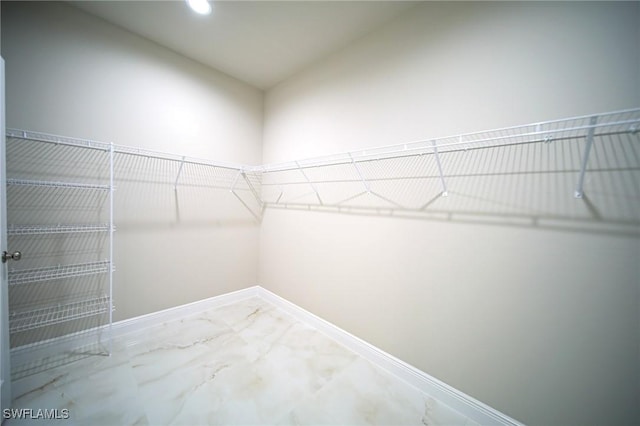 2817 43rd St W, Lehigh Acres, FL 33971 - spacious closet with marble look tiles
