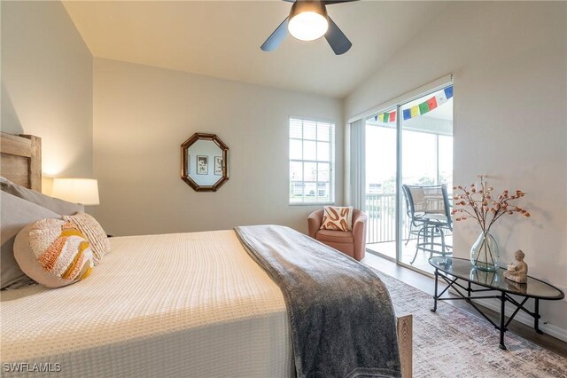 6325 Wilshire Pines Cir Unit 3, Naples, FL 34109 - bedroom featuring access to exterior, wood finished floors, lofted ceiling, and ceiling fan