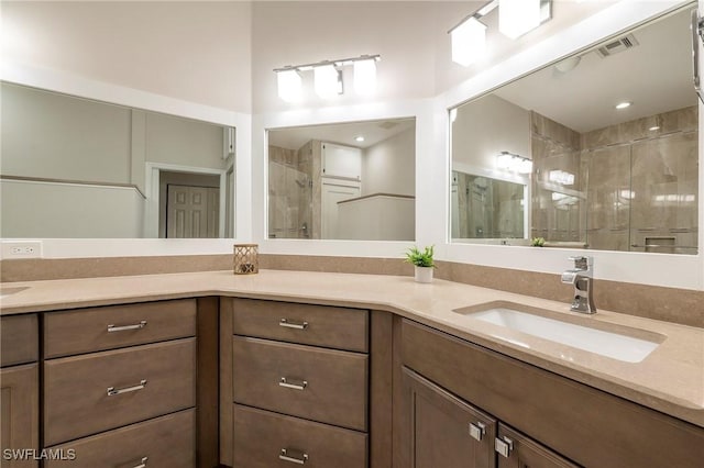 6325 Wilshire Pines Cir Unit 3, Naples, FL 34109 - full bath with double vanity and a stall shower