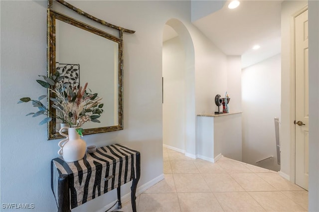 6325 Wilshire Pines Cir Unit 3, Naples, FL 34109 - corridor featuring arched walkways, tile patterned floors, and recessed lighting