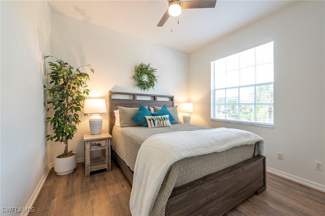 6325 Wilshire Pines Cir Unit 3, Naples, FL 34109 - bedroom with wood finished floors, multiple windows, and ceiling fan