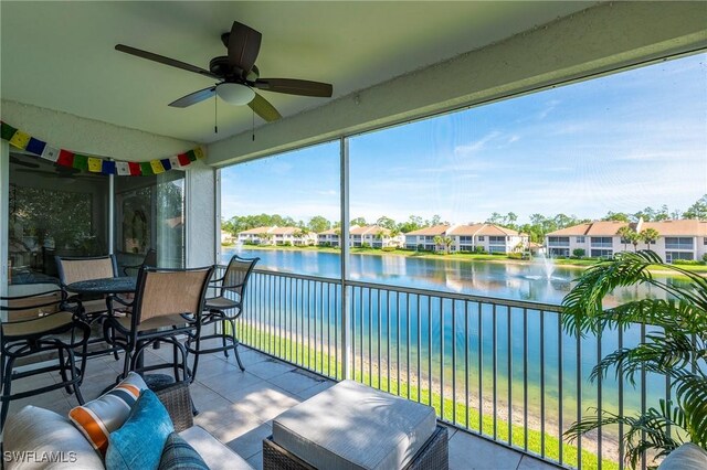 6325 Wilshire Pines Cir Unit 3, Naples, FL 34109 - sunroom / solarium with a water view and a residential view