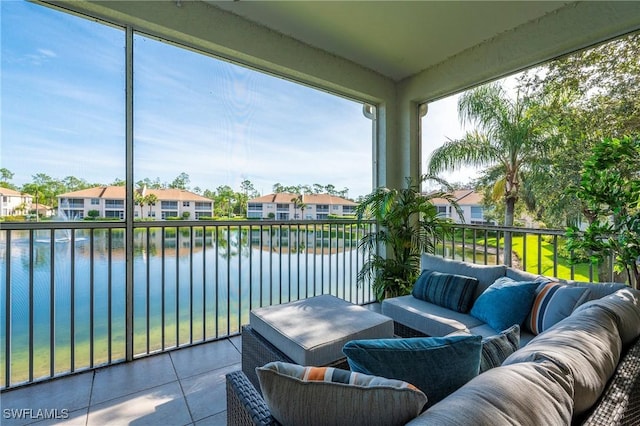 6325 Wilshire Pines Cir Unit 3, Naples, FL 34109 - balcony featuring a water view, a residential view, and outdoor lounge area