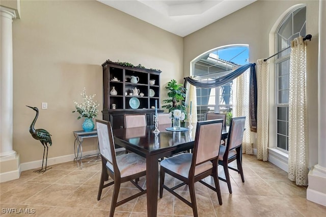 9693 Cobalt Cove Cir, Naples, FL 34120 - dining room with ornate columns and light tile patterned flooring