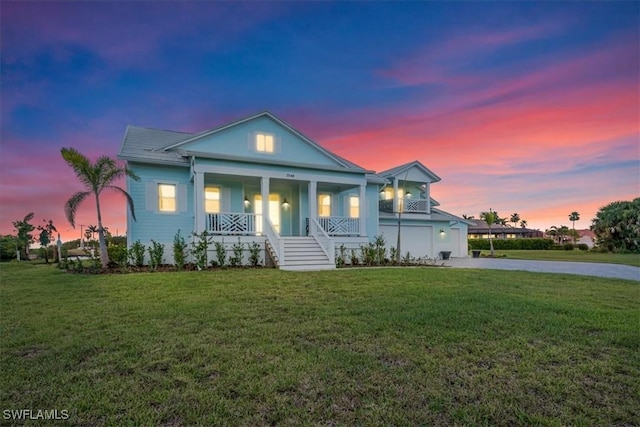 3548 Mondovi Ct, Punta Gorda, FL 33950 - neoclassical / greek revival house featuring driveway, a porch, and a front yard