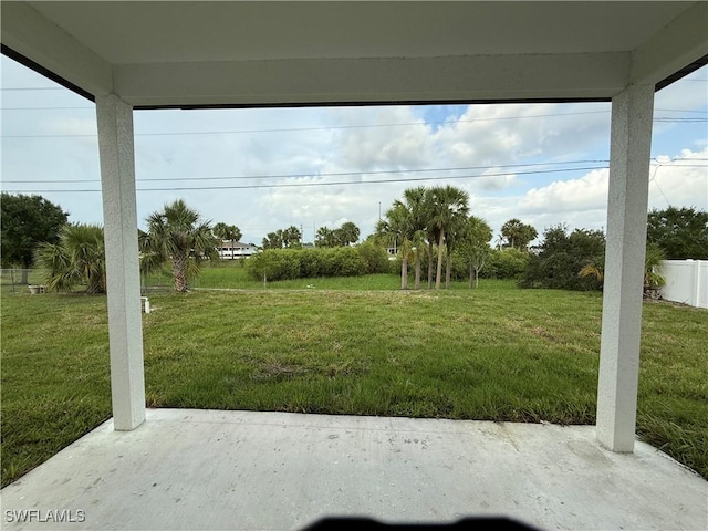 2035 NE 9th Ave, Cape Coral, FL 33909 - view of grassy yard featuring a patio
