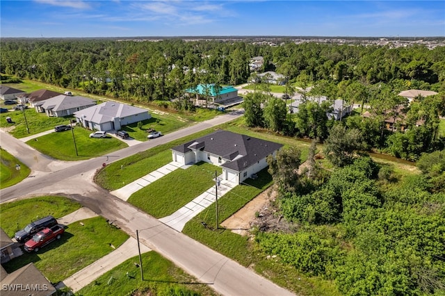 2401-2403 Quentin Ave S, Lehigh Acres, FL 33973 - aerial view of residential area featuring a forest