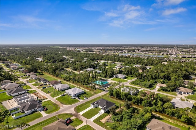 2401-2403 Quentin Ave S, Lehigh Acres, FL 33973 - aerial overview of property's location with nearby suburban area