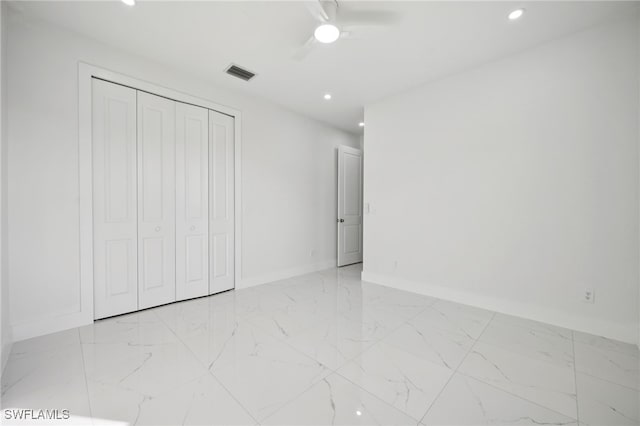 2401-2403 Quentin Ave S, Lehigh Acres, FL 33973 - unfurnished bedroom with light marble finish floors, recessed lighting, a closet, and ceiling fan
