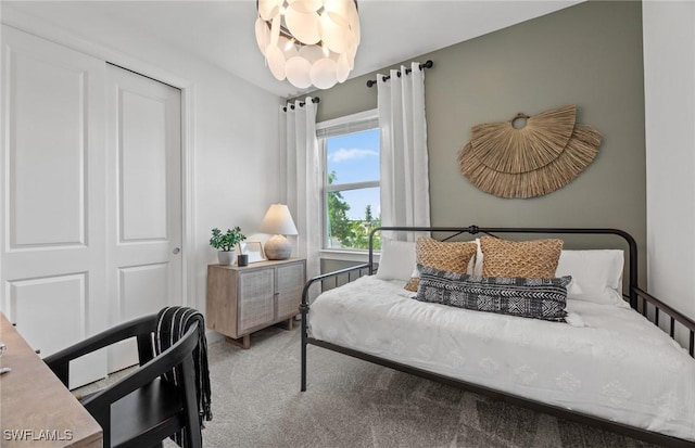 604 Oasis Lake Pl, Lehigh Acres, FL 33936 - carpeted bedroom featuring a closet and a chandelier