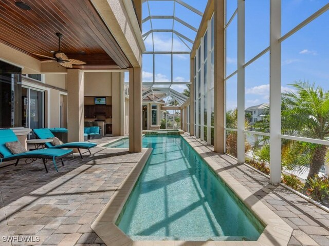 504 Tigertail Ct, Marco Island, FL 34145 - view of swimming pool with ceiling fan, a patio area, a lanai, and a pool with connected hot tub
