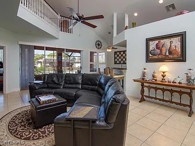 27329 Jolly Roger Ln, Bonita Springs, FL 34135 - living area with ceiling fan, light tile patterned floors, a towering ceiling, and recessed lighting