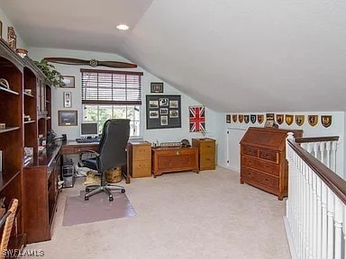 27329 Jolly Roger Ln, Bonita Springs, FL 34135 - office area featuring vaulted ceiling and carpet flooring