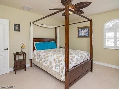 27329 Jolly Roger Ln, Bonita Springs, FL 34135 - bedroom with carpet floors and ceiling fan