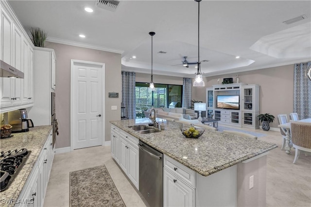 2786 Aviamar Cir, Naples, FL 34114 - kitchen featuring dishwasher, black gas stovetop, ceiling fan, a kitchen island with sink, and a raised ceiling