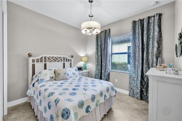 2786 Aviamar Cir, Naples, FL 34114 - bedroom with baseboards and light tile patterned flooring