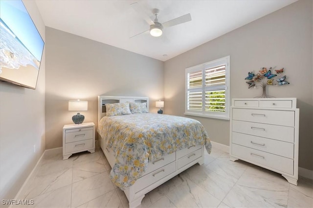 28646 Lobos Cir, Bonita Springs, FL 34135 - bedroom featuring light marble finish floors and ceiling fan