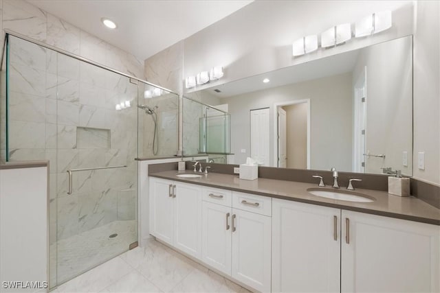 28646 Lobos Cir, Bonita Springs, FL 34135 - bathroom with a marble finish shower, double vanity, marble finish floors, and recessed lighting