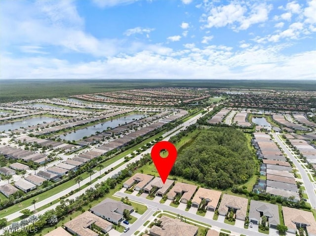 28646 Lobos Cir, Bonita Springs, FL 34135 - aerial view of property and surrounding area with a nearby body of water and nearby suburban area