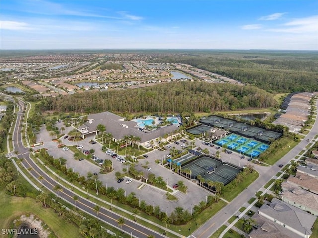 28646 Lobos Cir, Bonita Springs, FL 34135 - aerial view of property and surrounding area with a nearby body of water and a forest